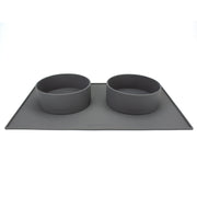 two silicone dog food bowls on top of a houndstone dog bowl mat charcoal