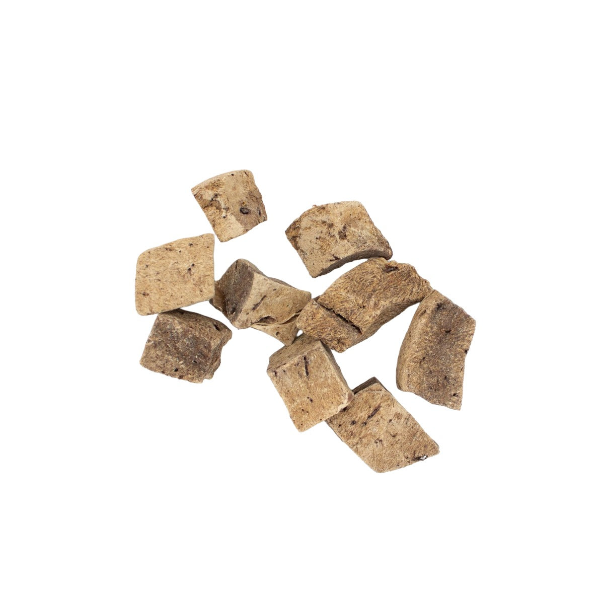 A pile of small, irregular brownish chunks of freeze dried dog treats arranged on a solid white background.