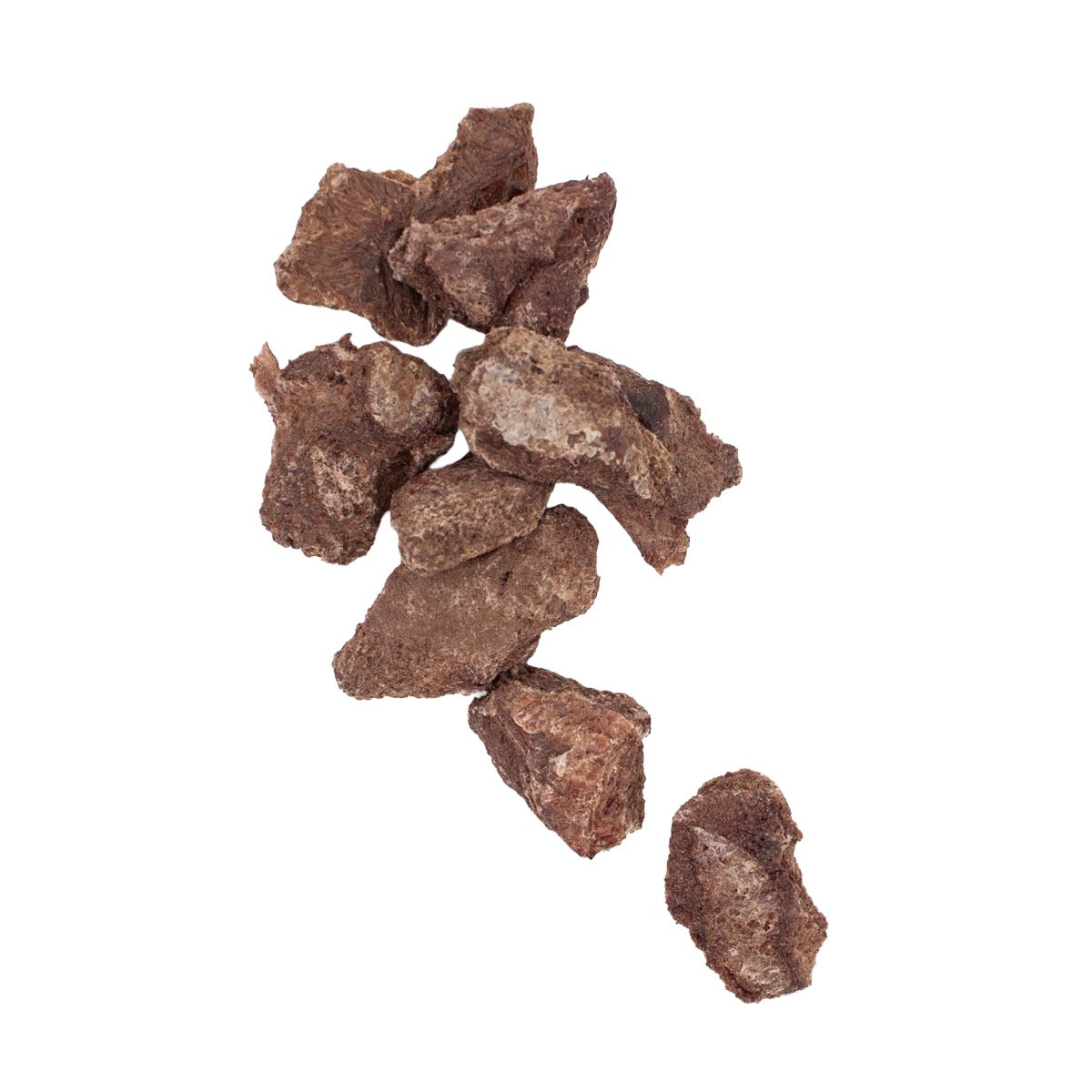 A pile of small pile of freeze dried dog treats arranged on a plain white background.