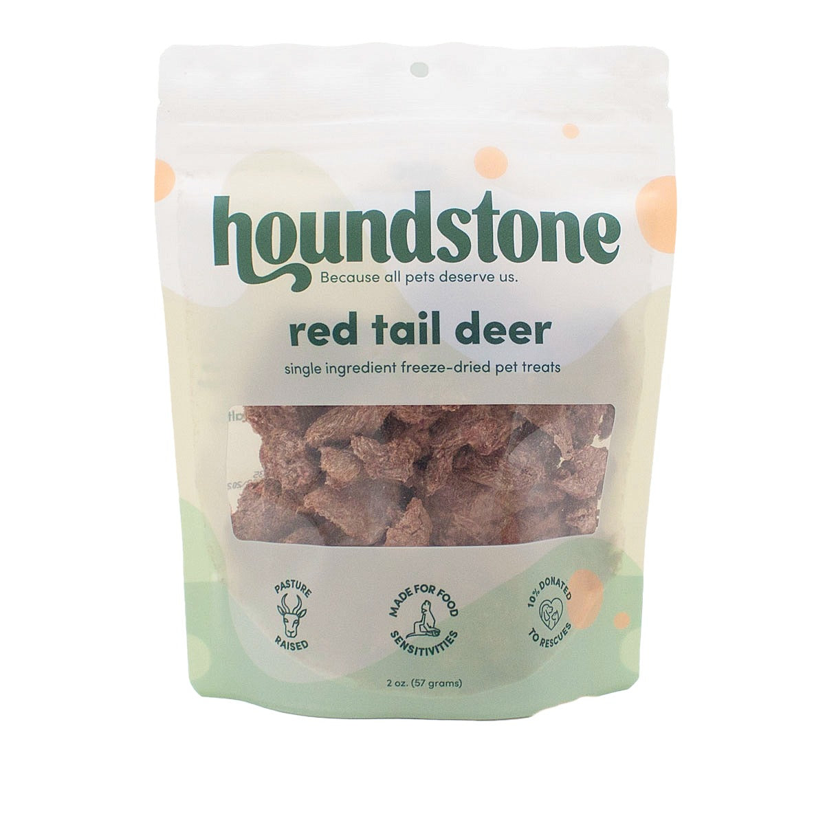 A 2 oz bag of Houndstone Red Tail Deer freeze dried dog treats, featuring a clear window showing the brownish dog treats inside, on a white background.