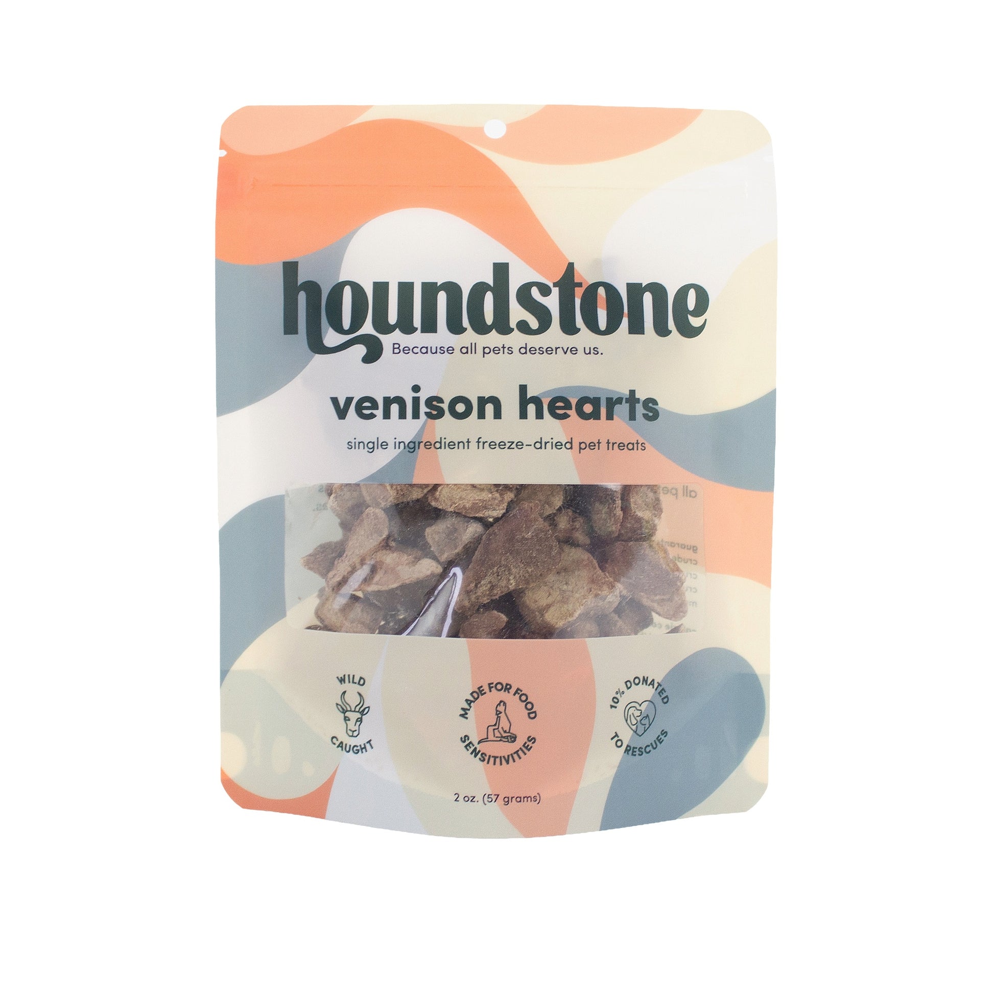A stand-up pouch of Houndstone venison hearts freeze dried dog treats on a plain white background. The packaging features a clear window showing the brown freeze dried dog treats inside.